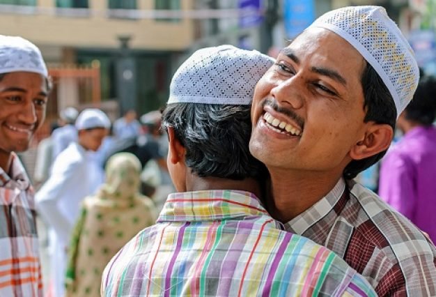 Nepali Muslims exchanging festival wishes and greeting each other during the festival of Eid al-Adha after prayers outside the Jame mosque in Kathmandu.