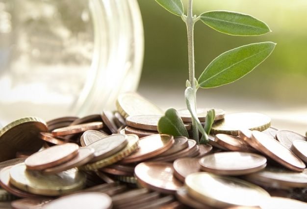 pot with coins saving concept