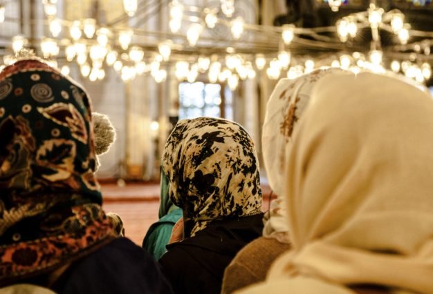 Women praying inside a mosque